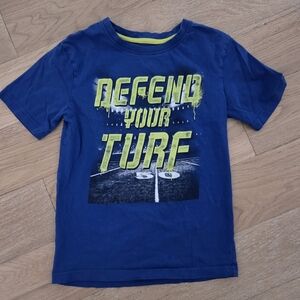GEORGE | 'Defend Your Turf' Graphic Tee